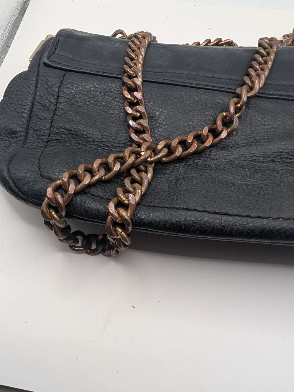 kate spade black leather crossbody with bronze chain